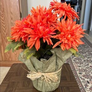 Orange Chrysanthemum Floral Arrangement with Green Leaves